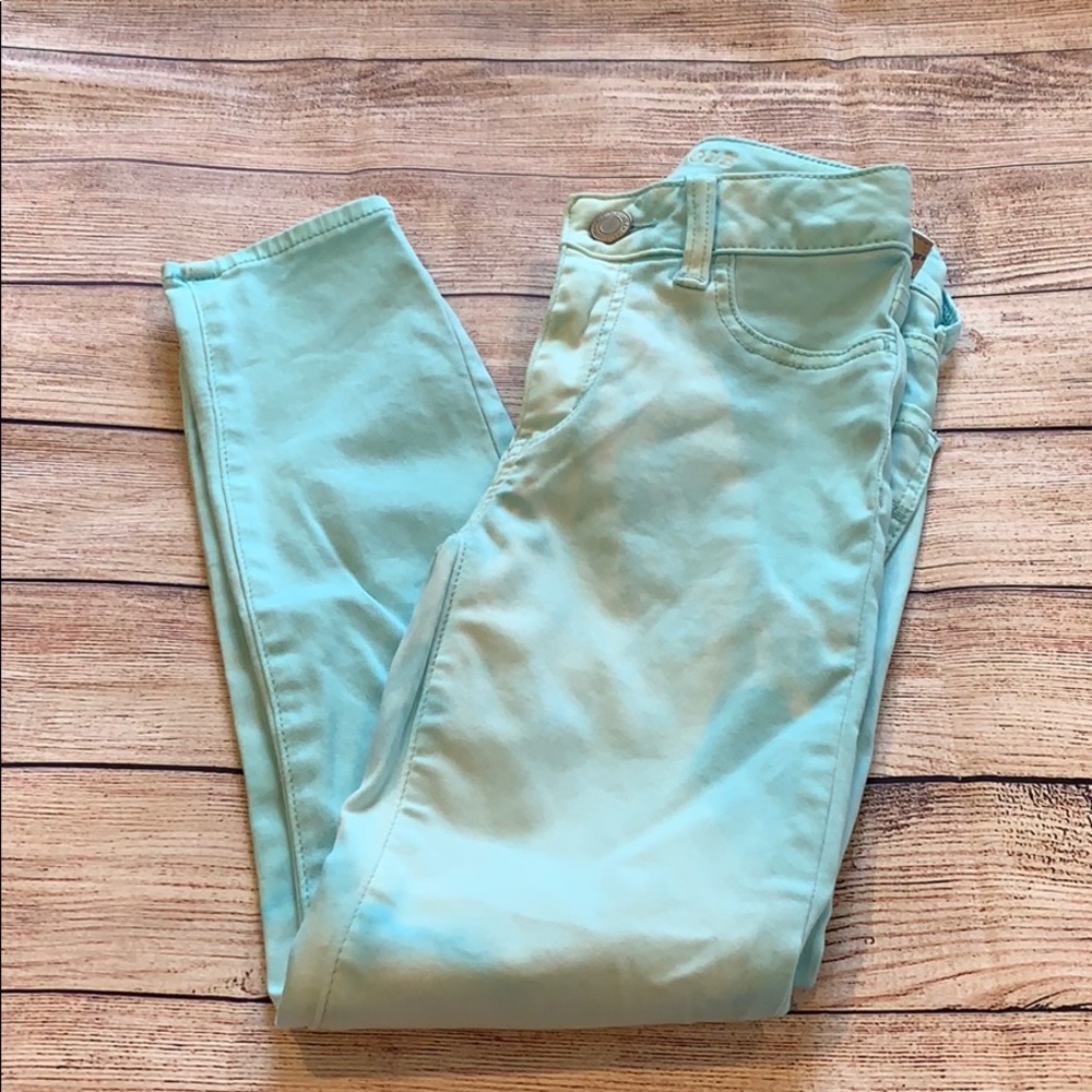 American Eagle tie dyed teal jeans, size 00.